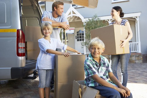 Packed moving boxes and labeled storage items