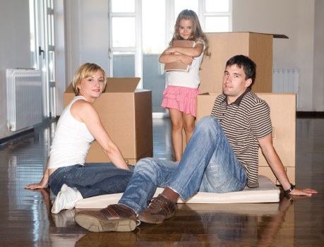 Professional movers handling furniture in Longford